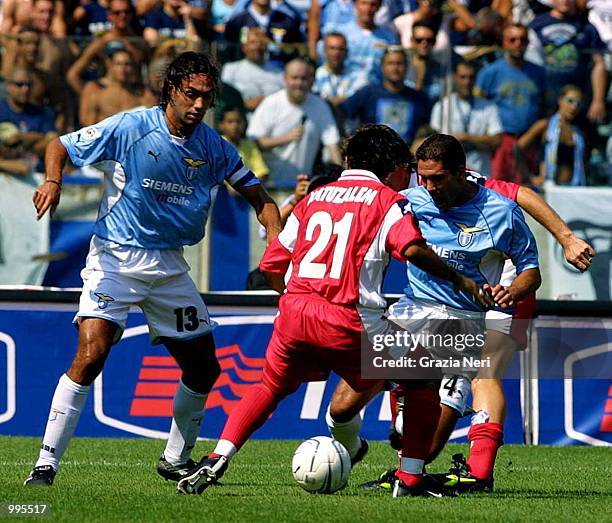 Nesta Alesandro, Pablo Simeone of Lazio and Matuzalem Francelino of Piacenza in action during the Serie A 1st Round League match between Lazio and...