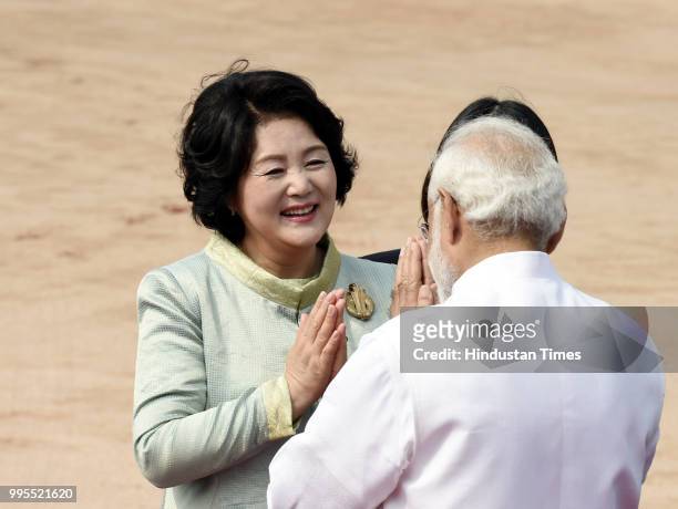 Kim Jung-sook , first lady and wife of South Korean president and Prime Minister Narendra Modi exchange greetings during a ceremonial reception at...