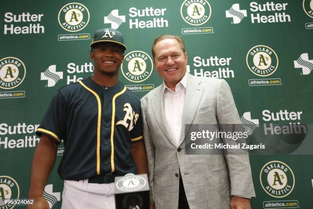 First round draft pick Kyler Murray of the Oakland Athletics and Agent Scott Boras stand together after a press conference at the Oakland Alameda...