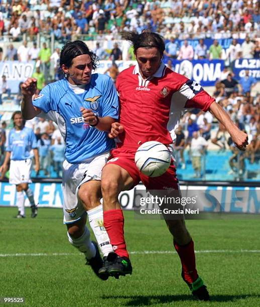 Lucas Castroman of Lazio and Gautieri Carmine of Piacenza in action during the serie A 1st Round League match between Lazio and Piacenza , played at...