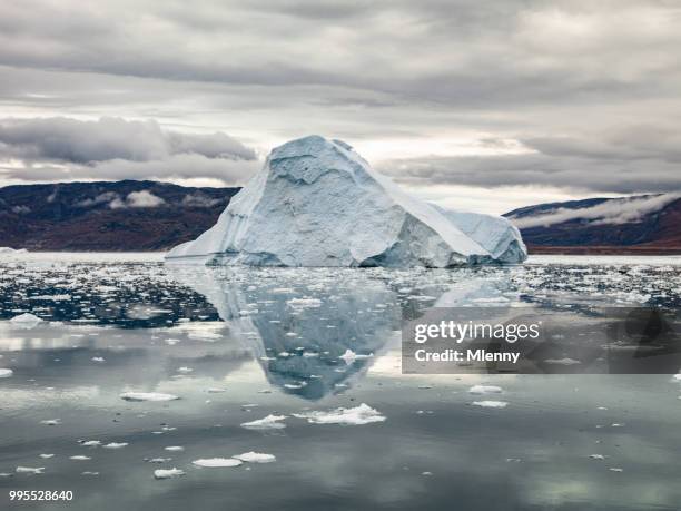 arctic iceberg reflections ilulissat greenland - fiorde de gelo de ilulissat imagens e fotografias de stock