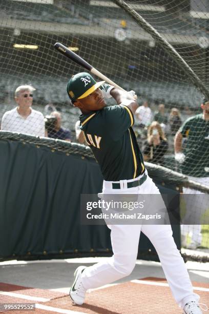 First round draft pick Kyler Murray of the Oakland Athletics takes batting practice after signing his contract at the Oakland Alameda Coliseum on...