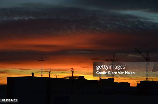 the sunset construction - halten stock pictures, royalty-free photos & images