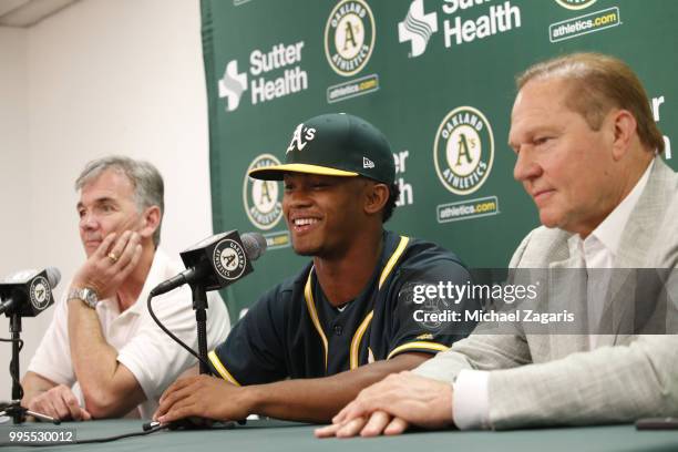 Executive Vice President of Baseball Operations Billy Beane of the Oakland Athletics, first round draft pick Kyler Murray and Agent Scott Boras talk...