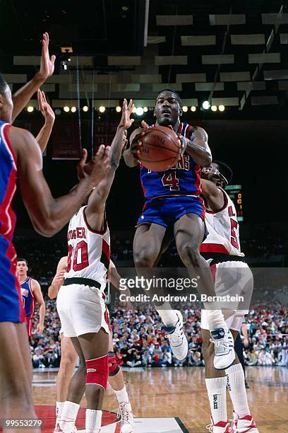 Joe Dumars of the Detroit Pistons goes up for a shot against the Portland Trail Blazers during Game Three of the 1990 NBA Finals on June 10, 1990 at...