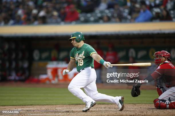 Josh Phegley of the Oakland Athletics bats during the game against the Los Angeles Angels of Anaheim at the Oakland Alameda Coliseum on June 15, 2018...