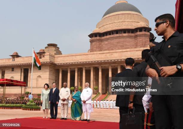 National Security Guard commandos stand guard as South Korea's President Moon Jae-in , his wife Kim Jung-sook , President Ram Nath Kovind with his...