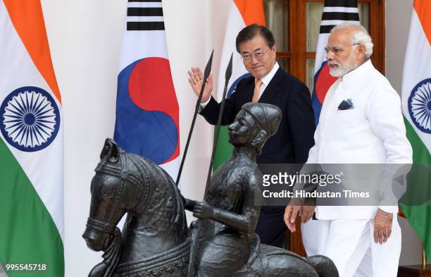 Prime Minister Narendra Modi with South Korean President Moon Jae-in head for their delegation level talk and signing of agreements at Hyderabad...