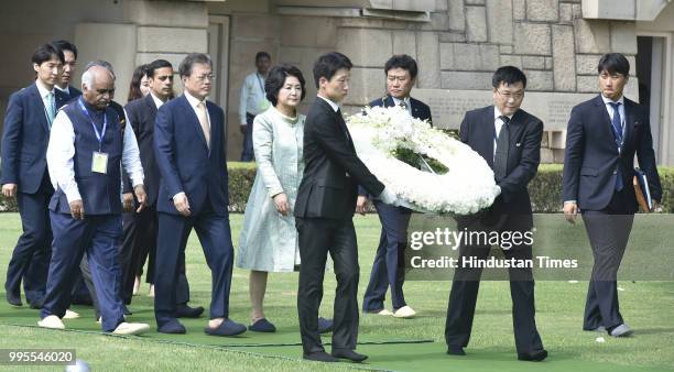 South Korean President Moon Jae-in and his wife Kim Jung-sook arrives to pay homage to Mahatma Gandhi at his memorial Rajghat, on July 10, 2018 in...