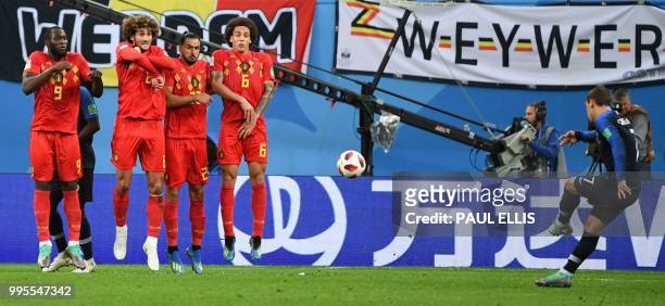 Belgium's forward Romelu Lukaku, Belgium's midfielder Marouane Fellaini, Belgium's midfielder Nacer Chadli and Belgium's midfielder Axel Witsel jump...