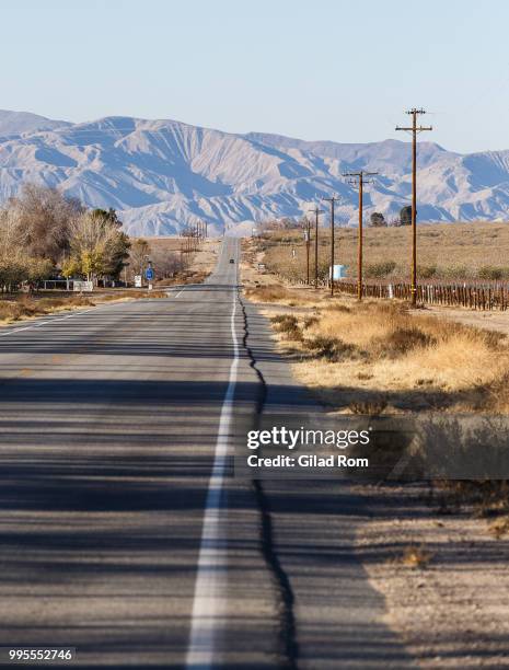 the endless road - gilad stock pictures, royalty-free photos & images