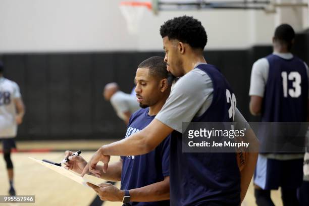 Assistant Coach J.J. Outlaw and DJ Stephens of the Memphis Grizzlies speak during practice on July 5, 2018 at the University of Utah in Salt Lake...