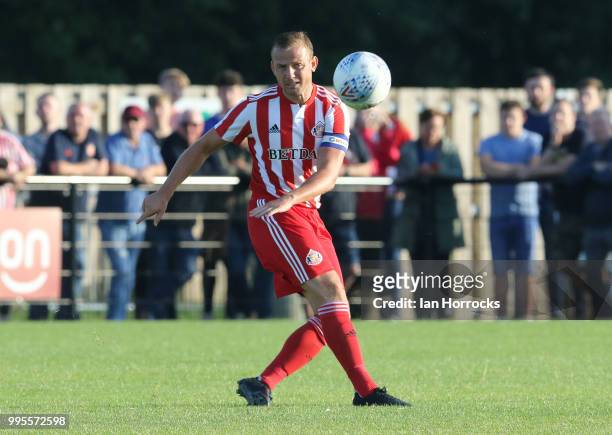 Lee Cattermole of Sunderland kicks the ball during a pre-season friendly game between Darlington FC and Sunderland AFC at Blackwell Meadows on July...