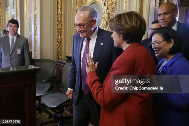 Senate Minority Leader Charles Schumer , Sen. Amy Klobuchar , Sen. Mazie Hirono and Sen. Cory Booker leave their caucus luncheon meeting at the U.S....