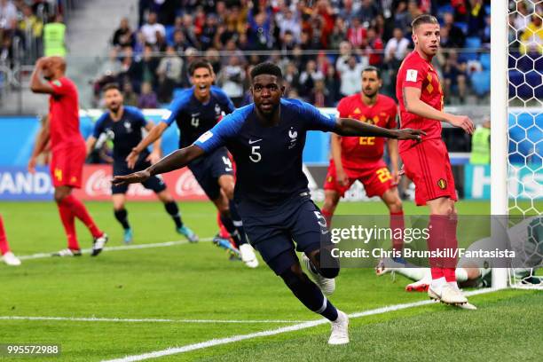 Samuel Umtiti of France celebrates after scoring his sides first goal during the 2018 FIFA World Cup Russia Semi Final match between Belgium and...