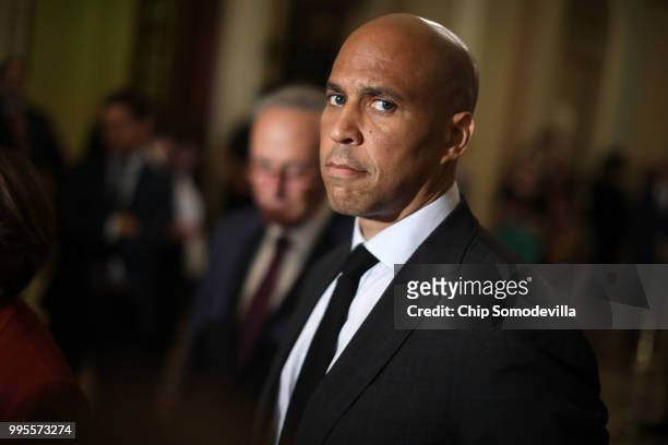 Sen. Cory Booker talks with reporters following the weekly Democratic policy luncheon meeting at the U.S. Capitol July 10, 2018 in Washington, DC....
