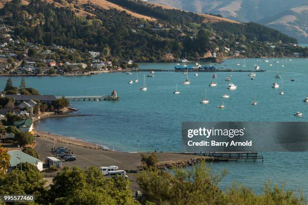 akaroa harbour - akaroa stock pictures, royalty-free photos & images
