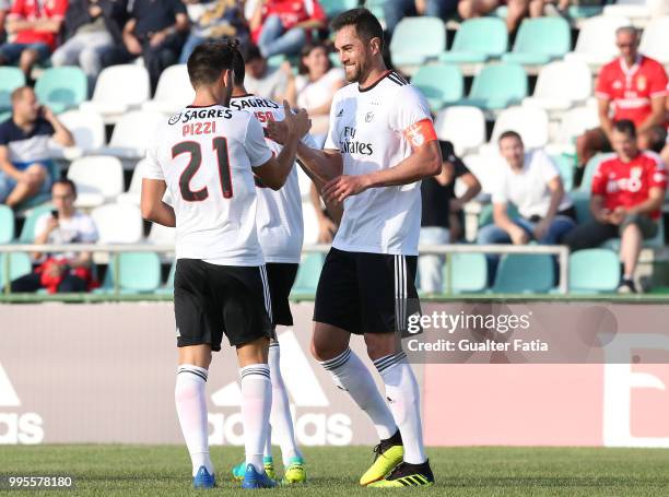 Benfica defender Jardel from Brazil celebrates with teammates after scoring a goal during the Pre-Season Friendly match between SL Benfica and FK...