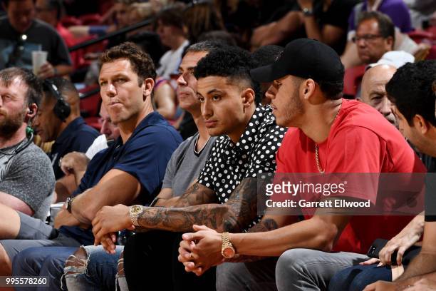 Head Coach Luke Walton General Manager Rob Pelinka Kyle Kuzma and Lonzo Ball of the the Los Angeles Lakers looks on during the 2018 Las Vegas Summer...