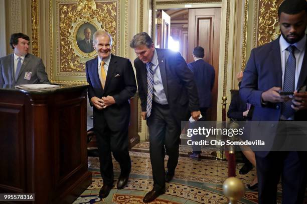 Sen. Bill Nelson and Sen. Joe Manchin leave the weekly Democratic policy luncheon meeting at the U.S. Capitol July 10, 2018 in Washington, DC....