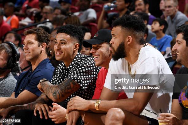 Head Coach Luke Walton Kyle Kuzma Lonzo Ball and JaVale McGee of the the Los Angeles Lakers look on during the game against the the Philadelphia...