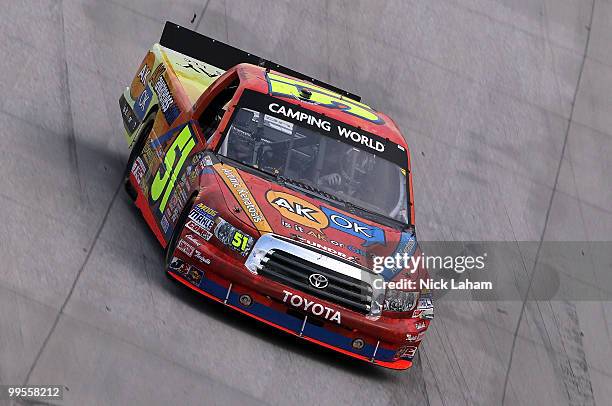 Aric Almirola drives the Graceway Pharm/AKawareness.com Toyota during the NASCAR Camping World Truck Series Dover 200 at Dover International Speedway...