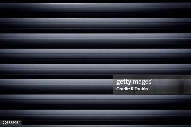 metal roller shutter texture background - roller shutter stock pictures, royalty-free photos & images