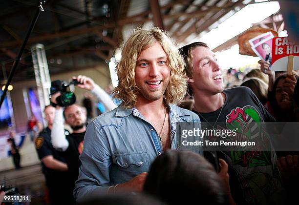 American Idol" Season 9 finalist Casey James greets fans after performing a front of a hometown audience May 14, 2010 in Fort Worth, Texas.