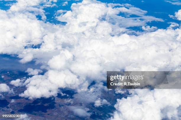 aerial view from airplane with earth and clouds - the natural world ストックフォトと画像