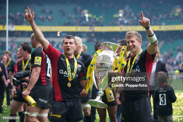 Richard Wigglesworth and David Strettle of Saracens with the trophy following the AVIVA Premiership Final between Leicester Tigers and Saracens at...