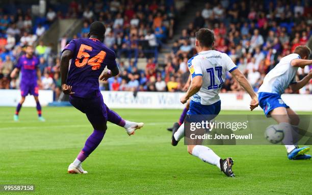 Sheyi Ojo of Liverpool scores a goal during the pre-season friendly match between Tranmere Rovers and Liverpool at Prenton Park on July 10, 2018 in...