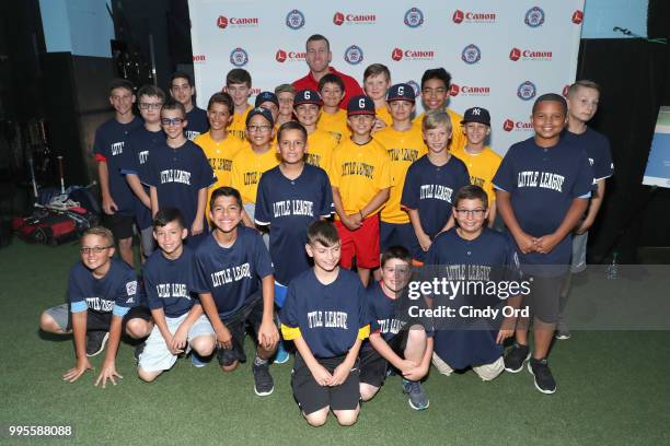Todd Frazier and members of the Greenwich Village and Toms River Little Leagues at the Canon #PIXMAPerfect Grand Slam event at New York Empire...