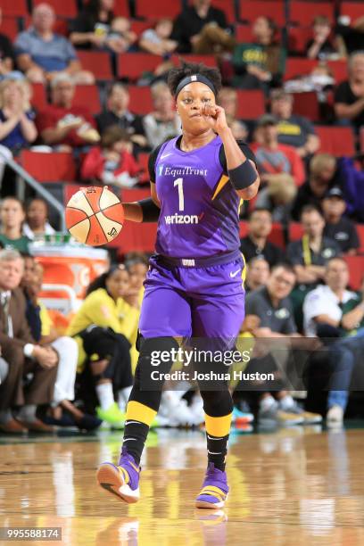 Odyssey Sims of the Los Angeles Sparks handles the ball against the Seattle Storm on July 10, 2018 at Key Arena in Seattle, Washington. NOTE TO USER:...