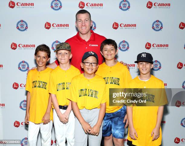 Todd Frazier and members of the Greenwich Village Little League at the Canon #PIXMAPerfect Grand Slam event at New York Empire Baseball on July 10,...