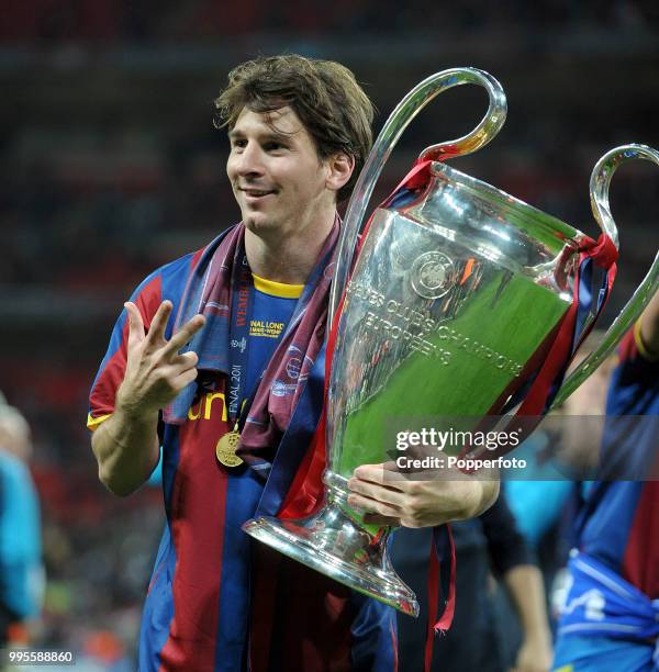 Lionel Messi of FC Barcelona celebrates with the European Cup following the UEFA Champions League final between FC Barcelona and Manchester United at...