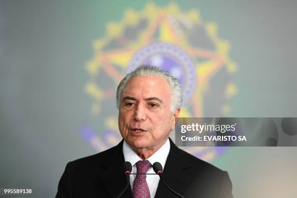 Brazilian President Michel Temer delivers a speech during the inauguration ceremony of his new Labour Minister Caio Vieira de Mello at the Planalto...