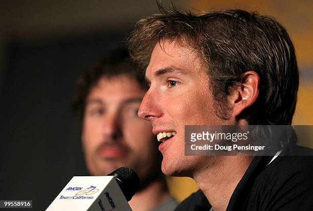 Andy Schleck of Luxemburg and riding for Saxo Bank addresses the media as teammate Fabian Cancellara looks on during a press conference prior to the...