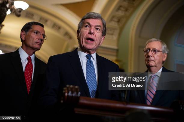 Sen. Roy Blunt speaks beside Sen. John Thune , left, and Senate Majority Leader Mitch McConnell , right, during a news conference following the...