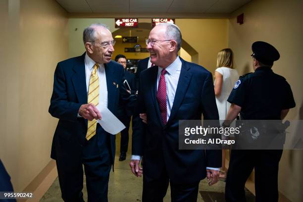 Sen. Chuck Grassley and Sen. Lamar Alexander confer as they depart the U.S. Capitol following a vote, on July 10, 2018 in Washington, DC.