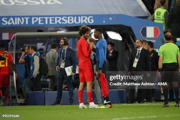 Manchester United teammates Marouane Fellaini of Belgium and Paul Pogba of France at full time during the 2018 FIFA World Cup Russia Semi Final match...