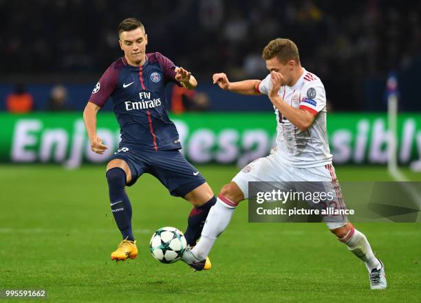 Bayern's Joshua Kimmich and Paris' Giovani Lo Celso in action during the Champions League football match between Paris St. Germain and Bayern Munich...