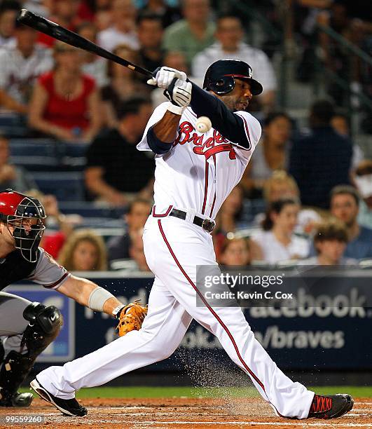 Jason Heyward of the Atlanta Braves fouls off a ball against the Arizona Diamondbacks at Turner Field on May 14, 2010 in Atlanta, Georgia.