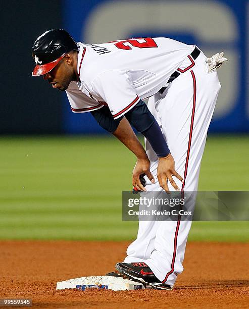 Jason Heyward of the Atlanta Braves takes a breath after hitting a double against the Arizona Diamondbacks at Turner Field on May 14, 2010 in...