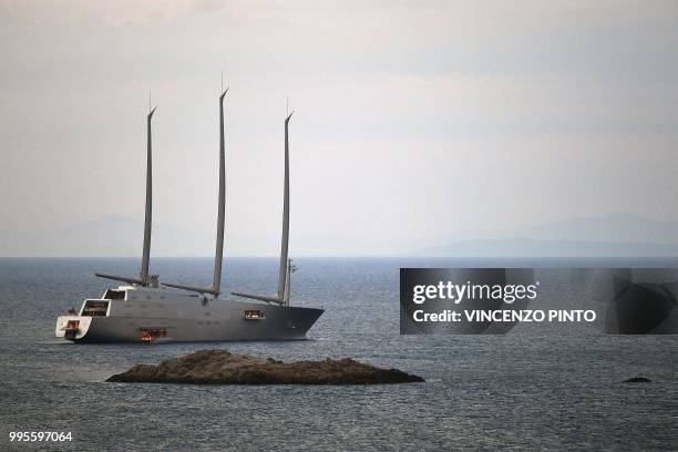 The luxury yacht " Sailing Yacht A " with her unique form, which was built for Russian billionaire Andrey Melnichenko, sails past Italian Isola del...