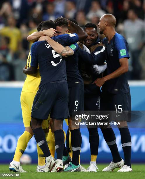 France players celebrate following their sides victory in the 2018 FIFA World Cup Russia Semi Final match between Belgium and France at Saint...