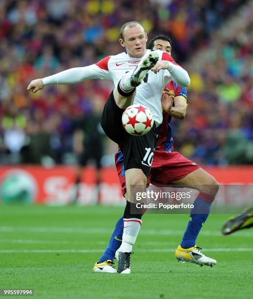 Wayne Rooney of Manchester United in action during the UEFA Champions League final between FC Barcelona and Manchester United at Wembley Stadium in...