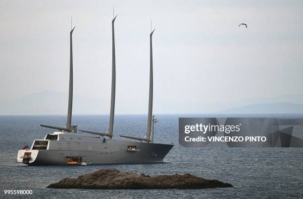 The luxury yacht " Sailing Yacht A " with her unique form, which was built for Russian billionaire Andrey Melnichenko, sails past Italian Isola del...