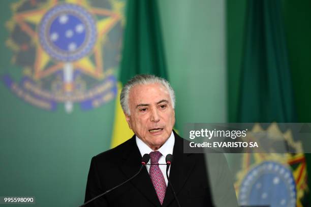 Brazilian President Michel Temer delivers a speech during the inauguration ceremony of his new Labour Minister Caio Vieira de Mello at the Planalto...