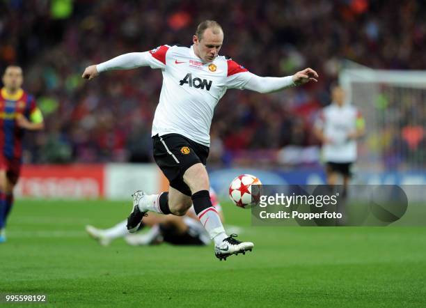 Wayne Rooney of Manchester United in action during the UEFA Champions League final between FC Barcelona and Manchester United at Wembley Stadium in...