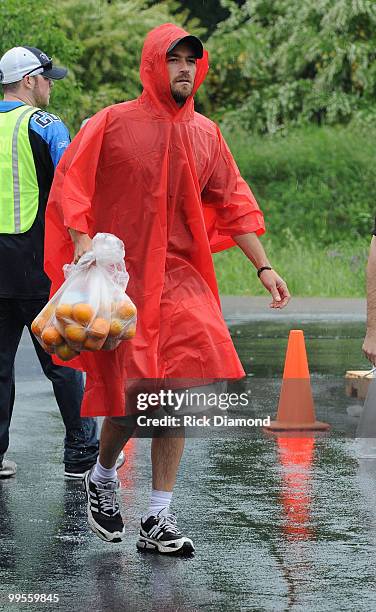 During lightening, hail and flash flood warnings Actor Luke Perry, part time Middle Tennessee resident volunteers with Soles4souls Inc.to bring...